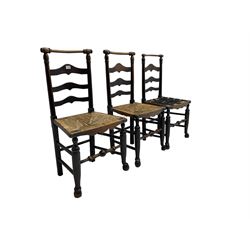 Set three elm country dining chairs, waived ladder back with rush seats