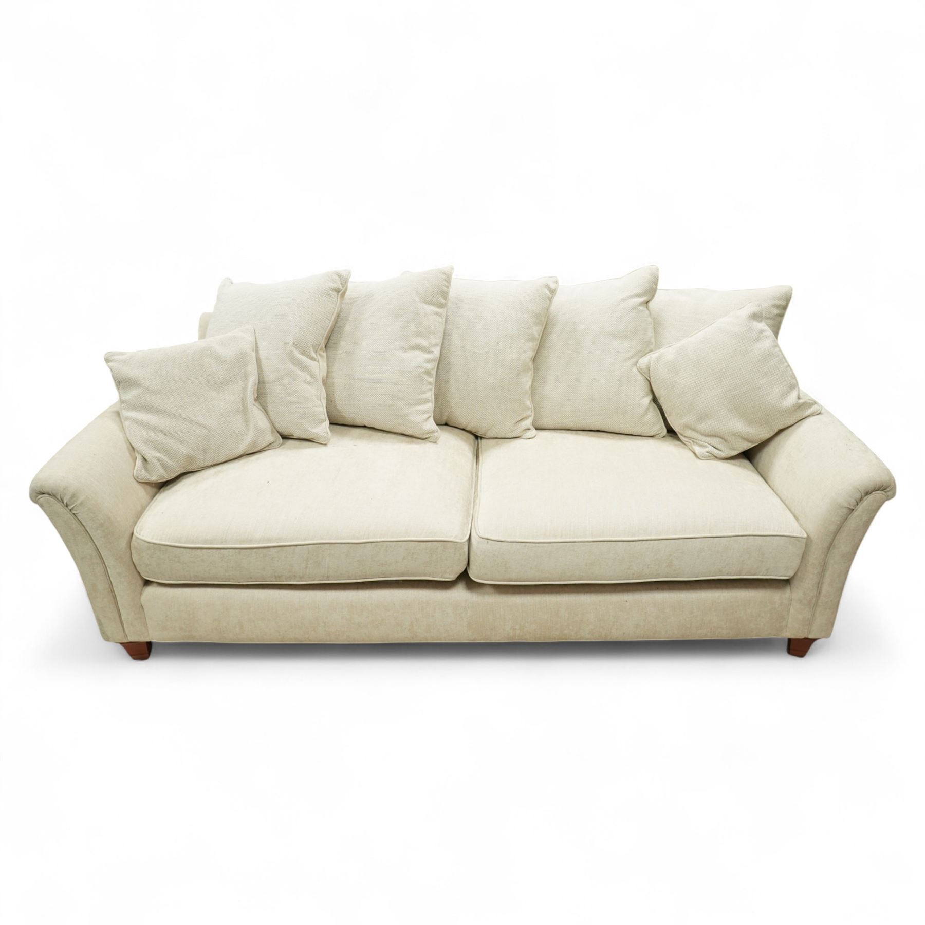 Parker Knoll - contemporary beige upholstered two seat sofa, with flared scroll arms and loose back and seat cushions, standing on stained tapered block feet