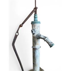 Georgian period lead garden water pump, with iron handle, set in square stone base