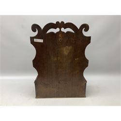 George III oak spoon rack and candle box, the shaped back with scroll crest, and two six aperture spoon racks, above a candle box enclosed by a sloped hinged lid, H54.5cm W38cm D13cm