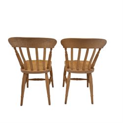 20th-century stripped pine dining table with four beech farmhouse kitchen chairs came, rectangular top with moulded edge and rounded corners, raised on four turned legs, chairs with curved back and turned supports with solid shaped seat raised on turned legs united by stretchers, W37xD39xH84cm