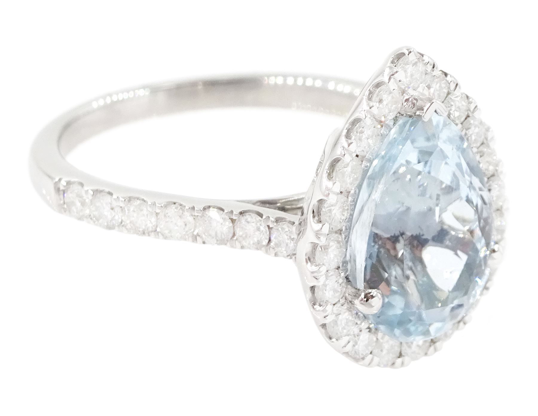 White gold aquamarine and diamond cluster ring, single pear cut aquamarine of approx 2.75 carat, surrounded by round brilliant cut diamonds and diamond set shoulders, hallmarked 9ct