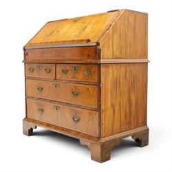 18th century figured walnut bureau, the sloped fall-front enclosing fitted interior with sliding base, pigeon-holes and correspondence drawers with shaped facias, over two short and two long feather-banded drawers with pressed brass handle plates, on bracket feet