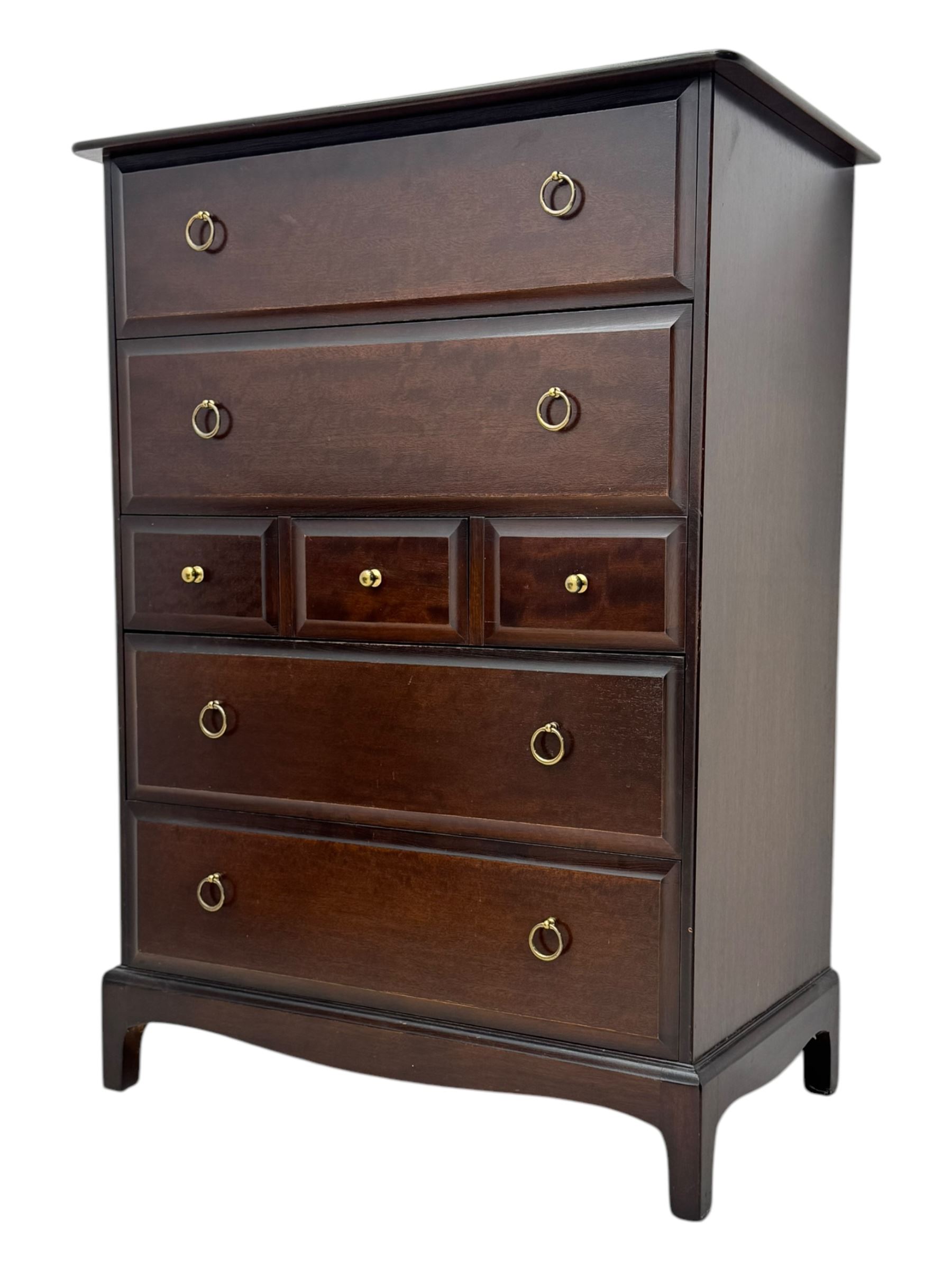 Stag Minstrel - mid-20th century chest, rectangular top over arrangement of three short and four long drawers, on bracket feet