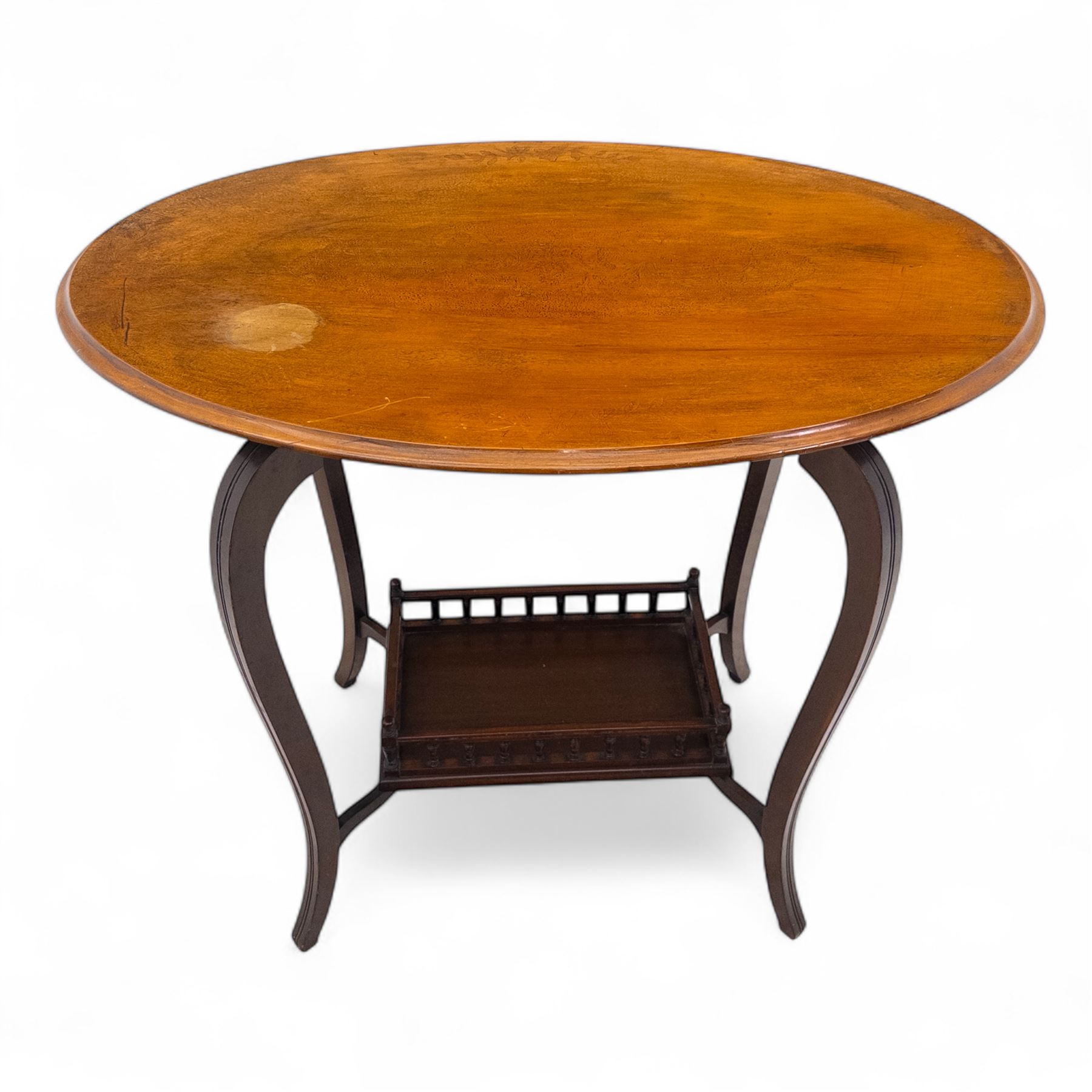 Set of two early 20th century mahogany occasional tables, comprising an oval example with under-tier and galleried shelf on swept supports, and a drop-leaf Sutherland table with turned gateleg supports and stretcher base (Oval H 74cm, W 57cm, D 86cm) (Sutherland H 71cm, W 30cm-94cm, D 76cm)