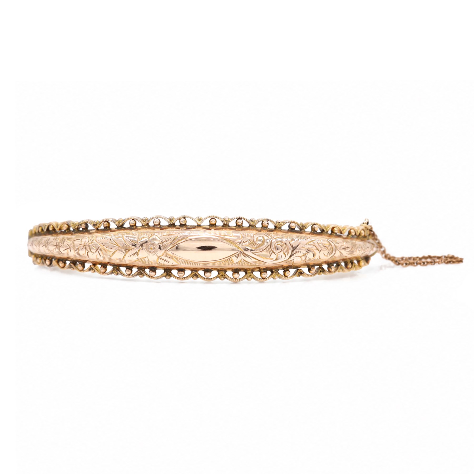 Edwardian 9ct rose gold bangle, with engraved decoration and wirework and bead work surround, Chester 1904