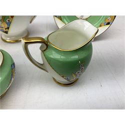 Royal Doulton Leonora pattern tea wares, Art Deco tea set the set with stylised gilded and painted flowers on a jade green and white background, comprising teapot, milk jug, open sucrier, tea cup,  saucer and dessert plate 