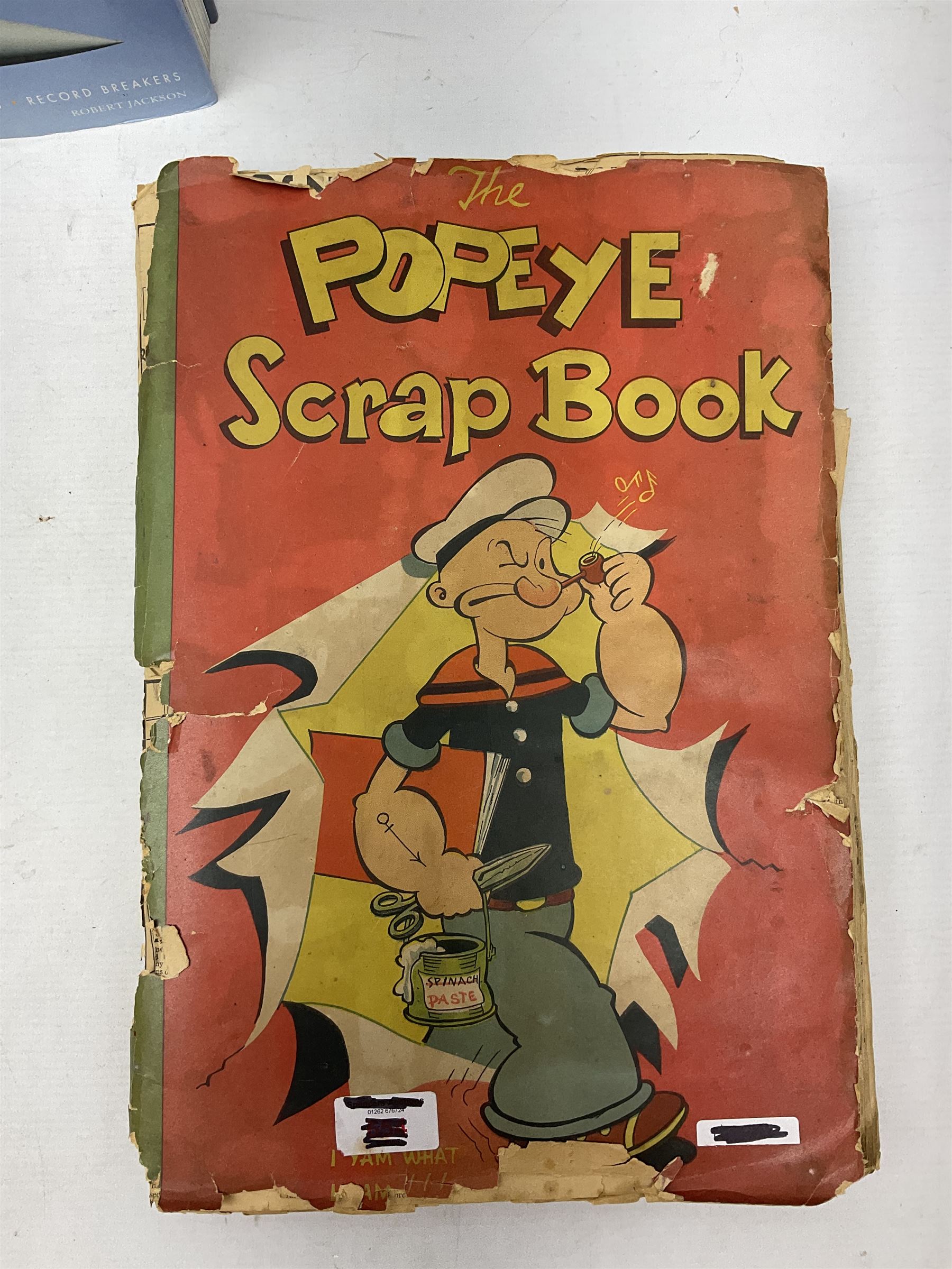 Ten books of predominantly military aircraft interest including Aircraft Anatomy World War Two, Hurricane Messerschmitt, The Avro Lancaster, The Luftwaffe Album, Encyclopaedia of Aircraft of WWII etc; together with a scrap album of WW2 newspaper cuttings