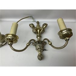 Siz branch silvered chandelier, decorated with acanthus leaves and putti, together with two matching three branch wall sconces, chandelier D65cm