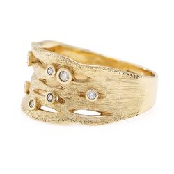 9ct gold diamond bubble ring, bezel set with seven round brilliant cut diamonds, in a textured pierced design setting, Birmingham 2008