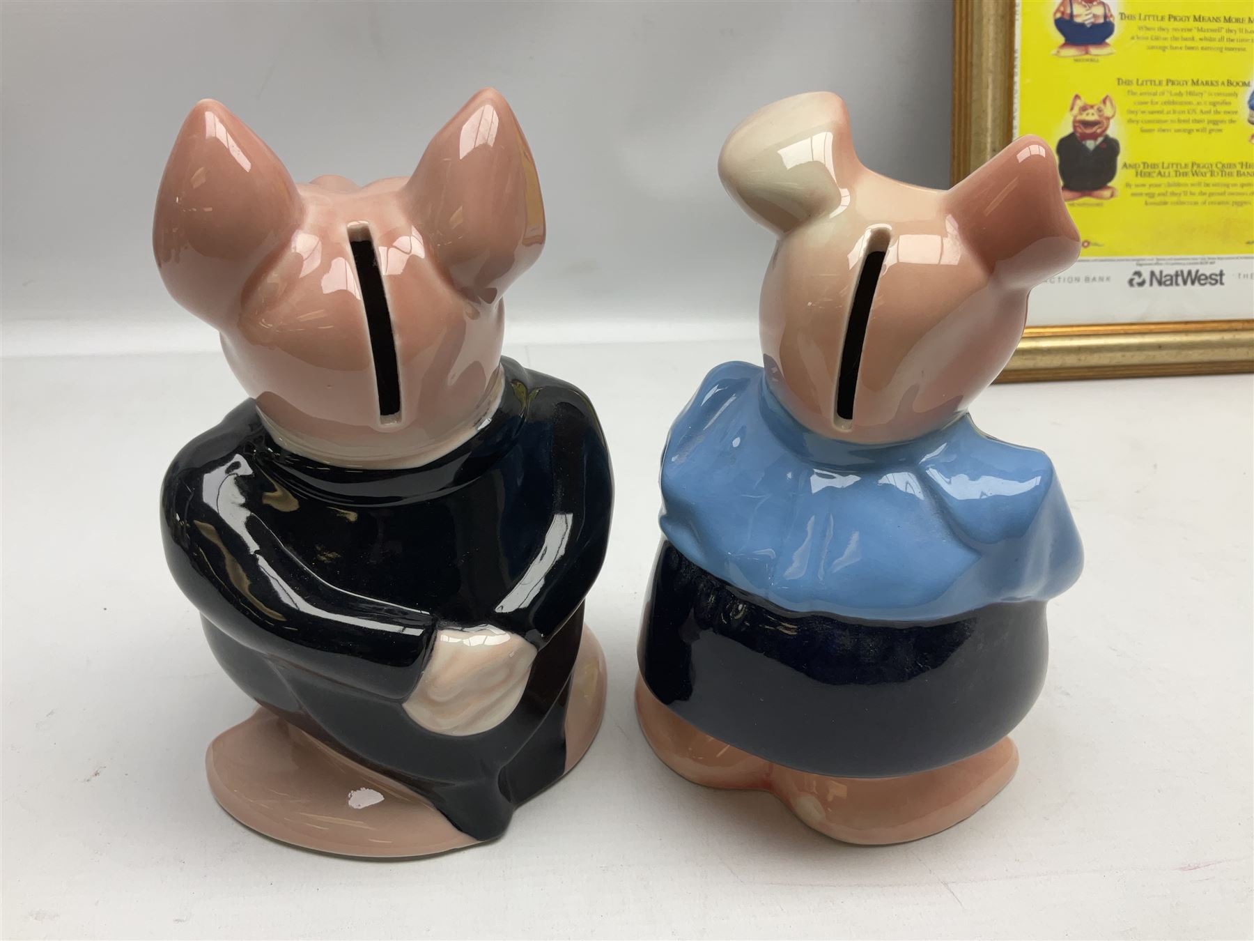  Full Set of Wade Natwest Pigs to include cousin Wesley, with an additional baby and framed leaflet 