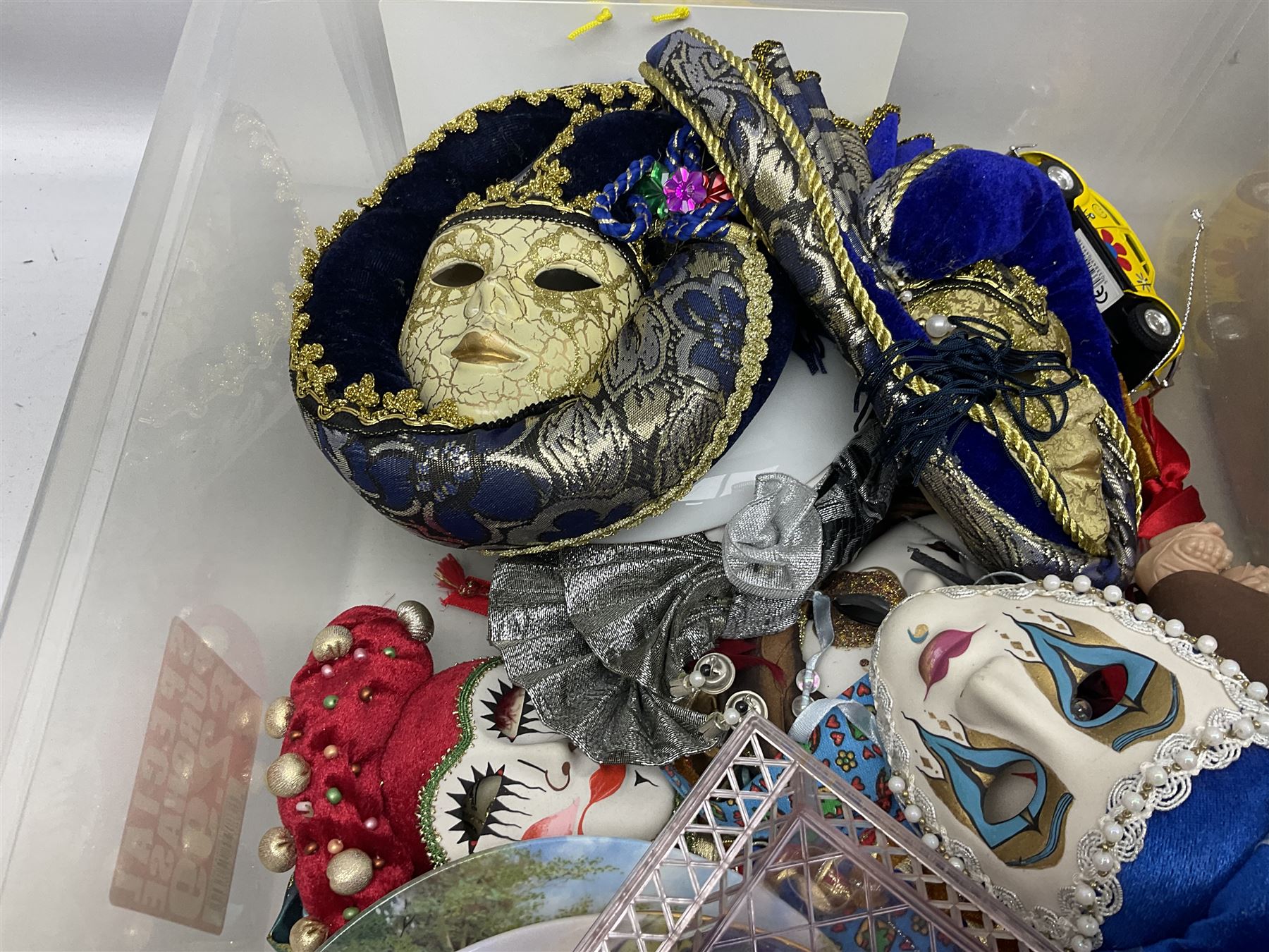 Collection of decorative Venetian masks together with other collectables, in two boxes 