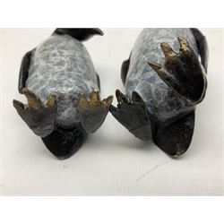 Steve Boss (British 1970-); Bronze figure group of a family of Emperor penguins, entitled Waddle, all with artists monogram beneath, tallest H12cm