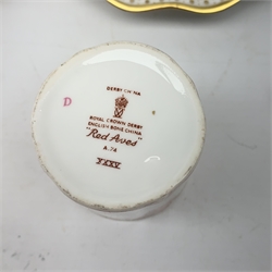 A selection of assorted Crown Derby, comprising three Mikado pattern dessert plates, D21.5cm, a Blue Aves pattern dish, a small Red Aves beaker, a Gold and Red Aves twin handled soup bowl with heraldic border, a small Royal Antoinette pattern plate, small commemorative dish, and a paperweight modelled in the form of a teddy bear (lacking stopper). 