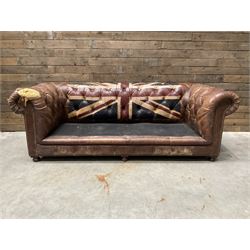Chesterfield two sofa upholstered in brown leather, with Union Jack pattern, no seat cushions - located in storage, viewing not available