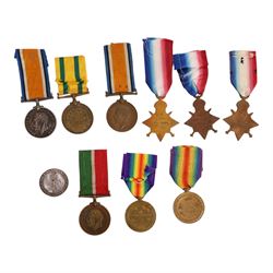 WWI British group of nine medals and silver war badge, including bronze War medal, 1914 Star with 5th Ayg-22nd Nov bar and rosette, South African Victory medal, Mercantile Marine medal, Territorial Force war medal