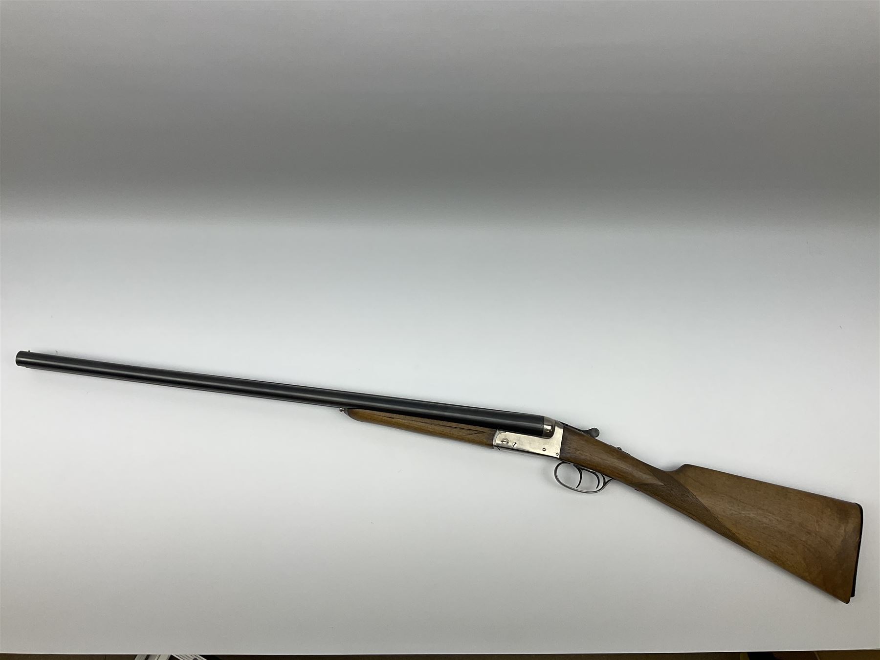 Spanish Master 12-bore side-by-side double barrel boxlock ejector sporting gun, 70.5cm barrels, pale walnut stock with chequered grip and plain fore-end and thumb safety, serial no.130828, L113cm SHOTGUN CERTIFICATE REQUIRED