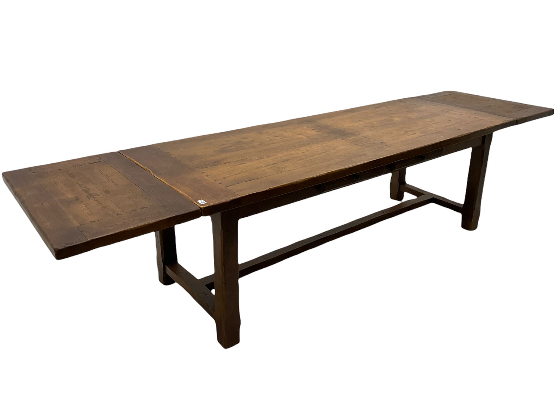 Antix French oak dining table with two leaves, two frieze drawers;, and six ladder back chairs with rush seats