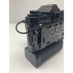 Canon A-1 camera body, serial no. 341014, with 'Canon FD 50mm 1:1.4 S.S.C.' lens, serial no. 12077119 and motor drive MA