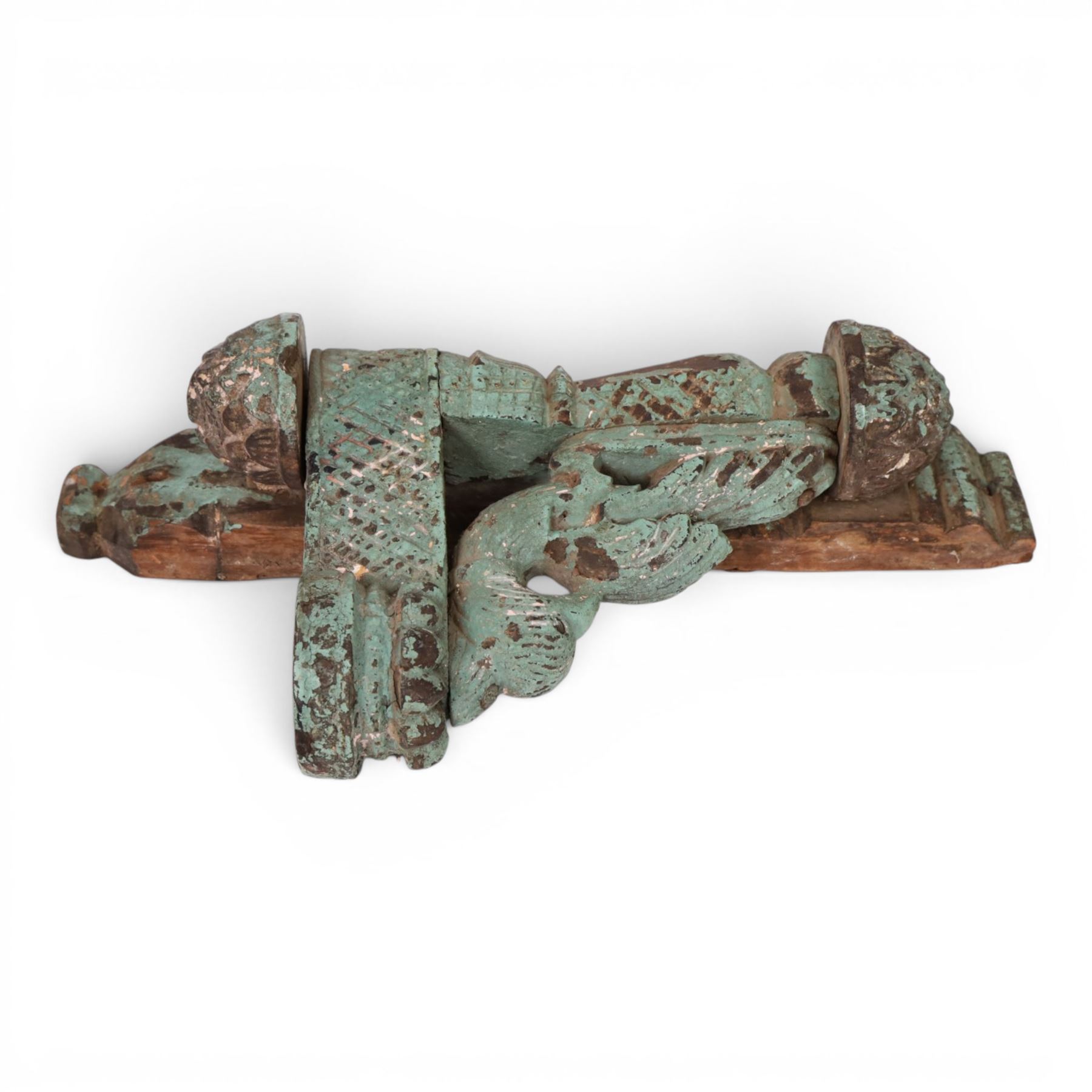 Indian candle bracket, in the form of a peacock, with residual blue paint, H42cm
