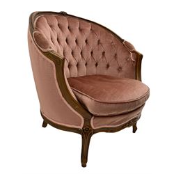 French style beech framed armchair, curved form with moulded frame, on cabriole supports carved with flower heads