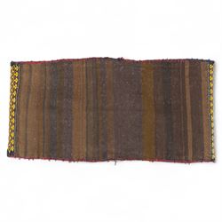 Persian Turkoman double saddlebag, north eastern region, with horizontal bands of multicoloured diamond motifs on a cream field, geometric border bands in red and black, joined with woven and wrapped centre panel