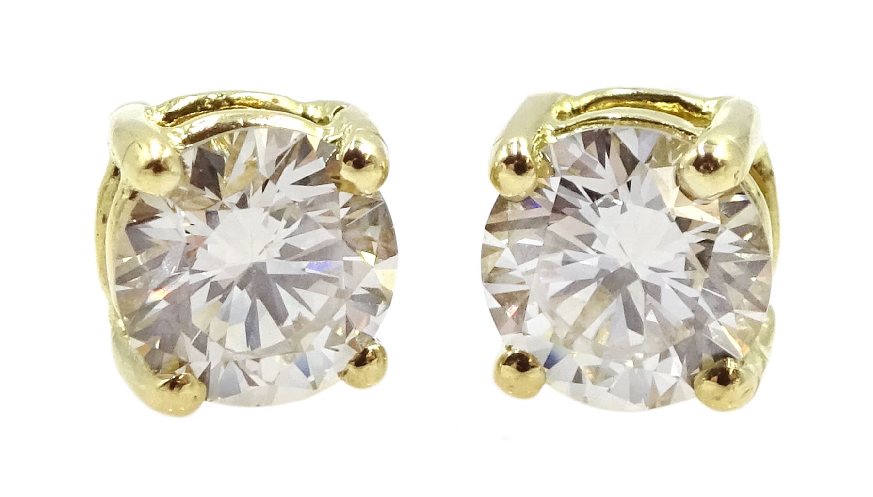 Pair of 18ct gold diamond stud earrings, stamped 750, total diamond weight 0.85 carat, with WGI certificate