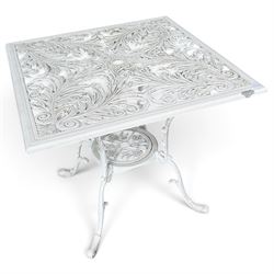 Regency design white-painted aluminium garden table, square pierced top with scrolling acanthus leaf decoration, splayed supports joined by pierced circular under-tier (W75cm H72cm), the chairs with scrolling and floral garland design backs over pierced foliate seats with cabriole supports (W48cm H90)