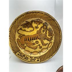 John Hudson: Large slipware charger in the style of Thomas Toft by John Hudson of Mirfield Pottery, decorated with the lion supporter taken by Toft from the Royal Arms, incised marks verso, D 44cm.
