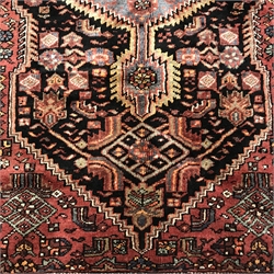 Hamadan red ground rug, central medallion, repeating border, 252cm x 143cm