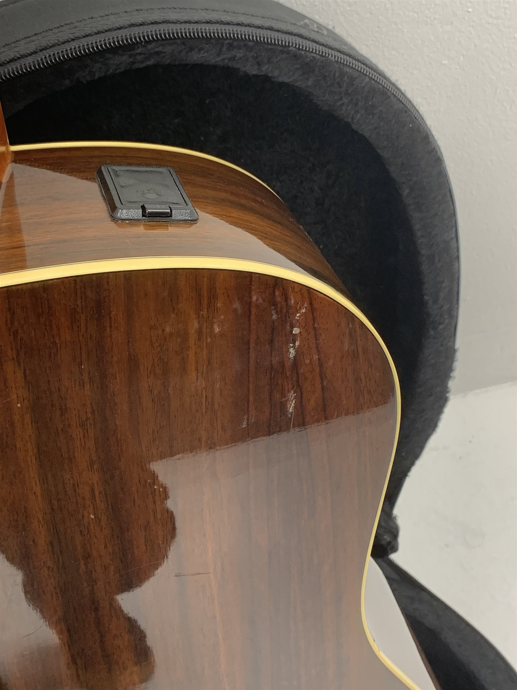  Yamaha model LLX6A acoustic/electric guitar with rosewood back and sides and spruce top, fitted with Yamaha tuner, serial no. QPH150011, L104cm, in hard carrying case. From the collection of the late John Burgess of Beverley who played in the bands Penjants, Wine, Strollers, Revox, Sound Foundation, Pickle Belly Alley, Ragamuffins and Jerryattricks.