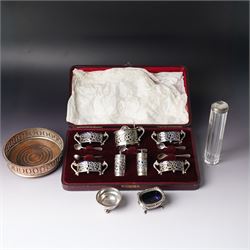 Set of four Edwardian pierced silver salts and matching mustard pot, all with blue glass l...