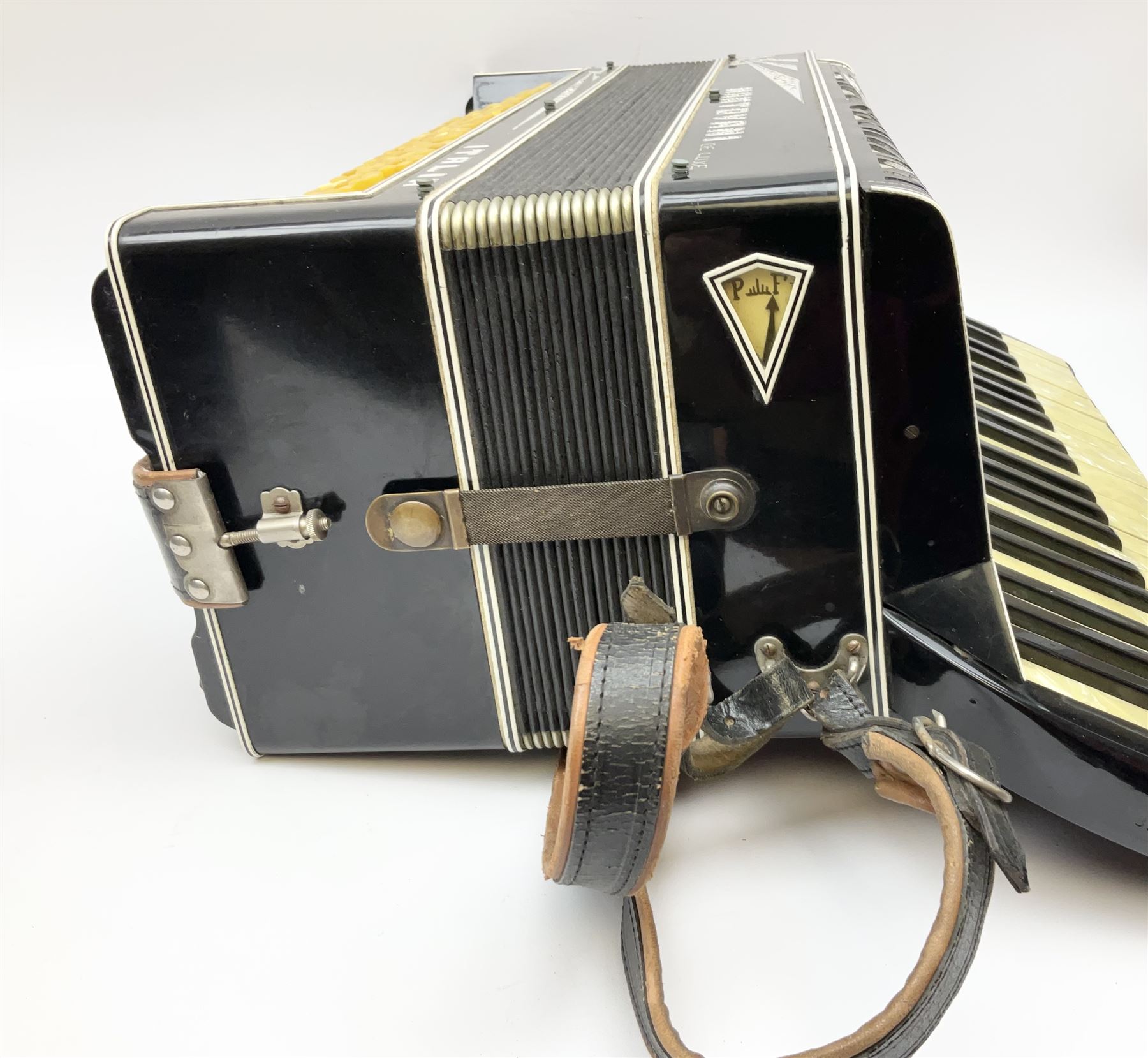 Italian Mantovani piano accordion with Art Deco style black and white case, twenty-four keys and one-hundred and twenty buttons L52cm in carrying case