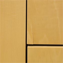 Contemporary maple veneered sideboard, serpentine glass top over six graduating Blum soft-close drawers, raised on curved black and gilt accented supports