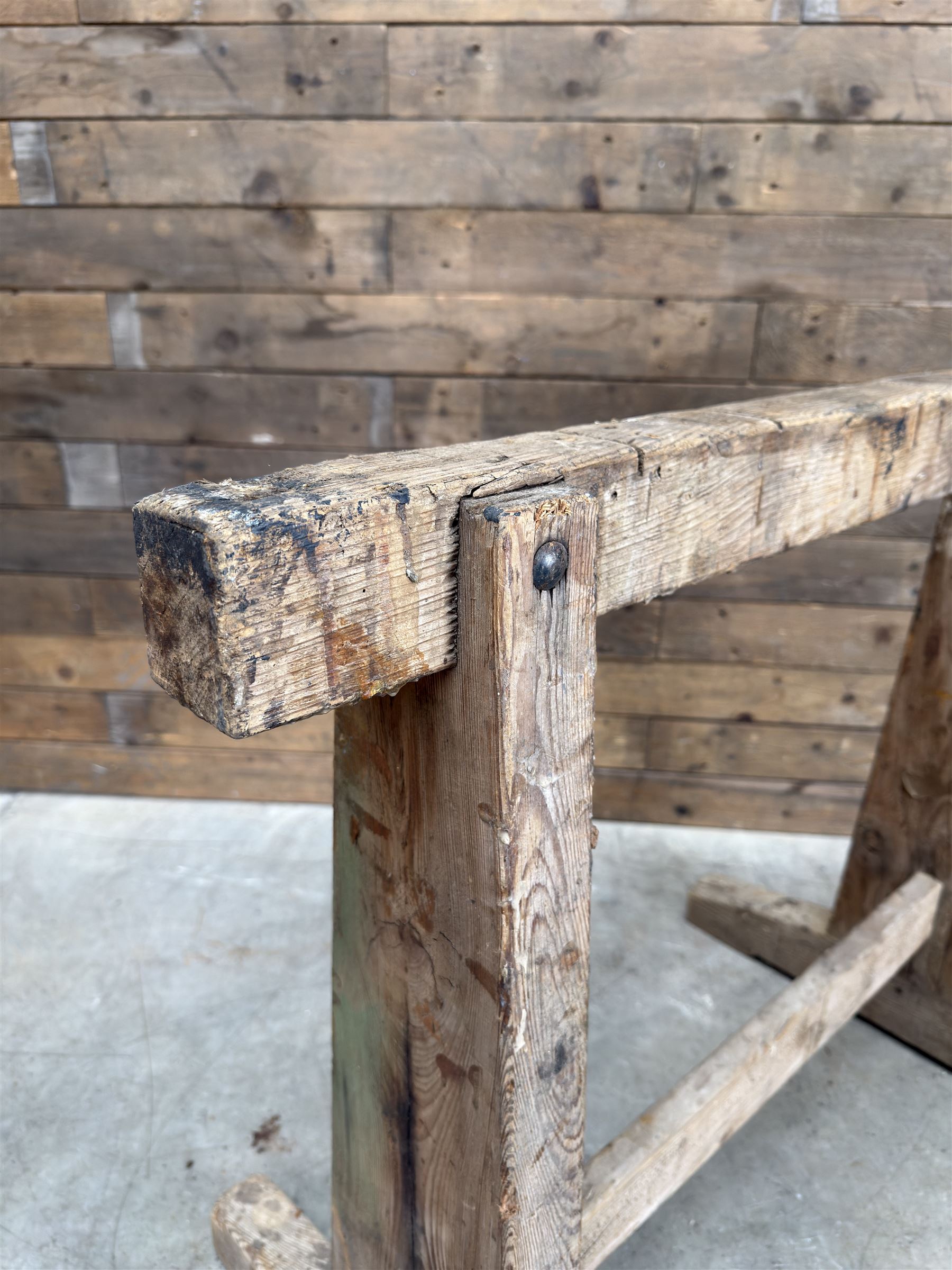 Pair of late 19th century pitch pine trestles, square tapering form in stripped finish