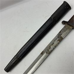 British Pattern 1888 knife bayonet, the 30.5cm double edged blade with raised central medial ridge; in leather covered scabbard L40.5cm overall