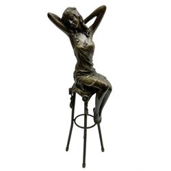 Art Deco style bronze modelled as a female figure seated upon a chair, after 'Pierre Collinet', H28cm