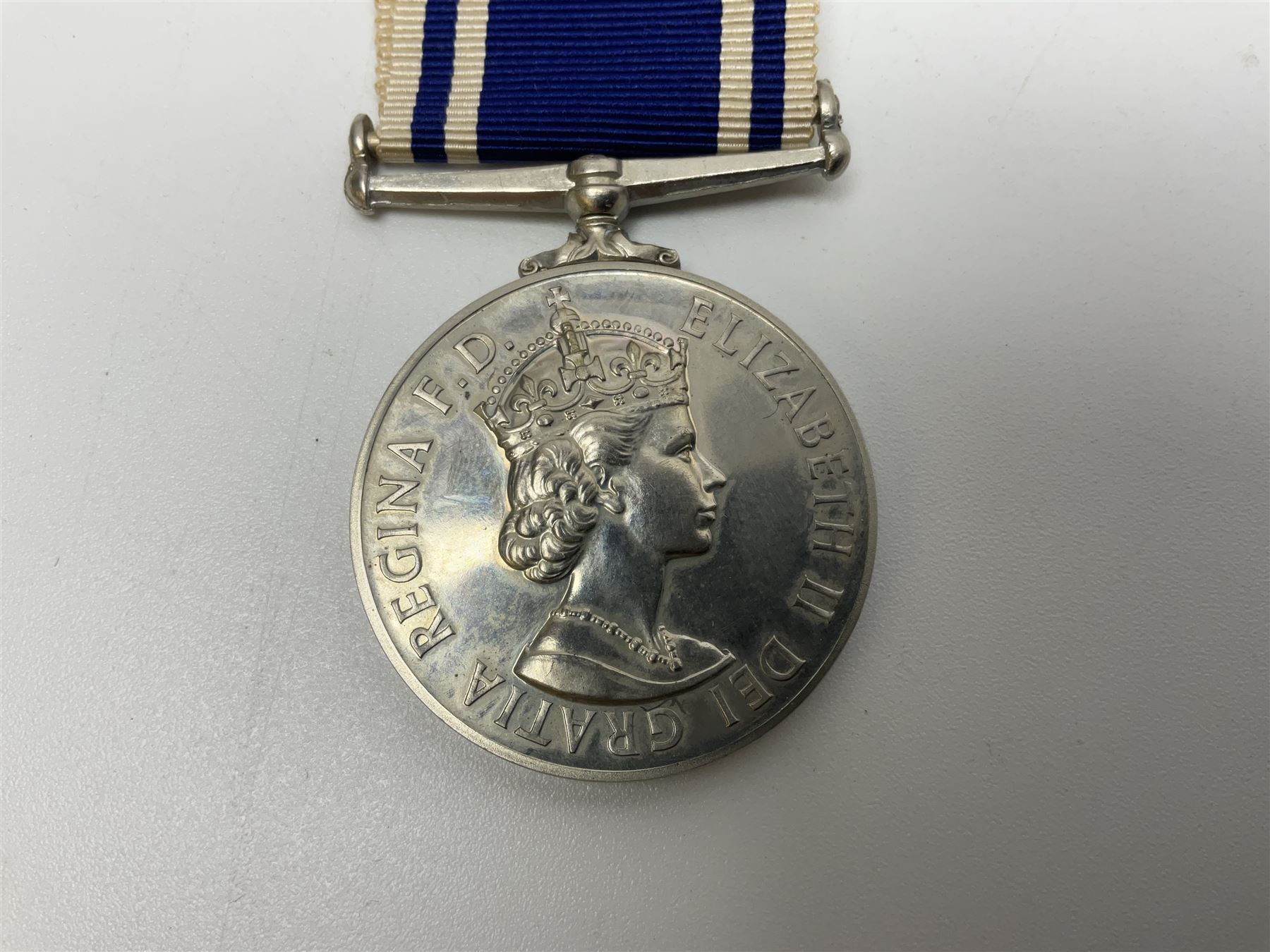 Collection of WW2 and police medals c.1933-1955, awarded to Eric Drinkwater comprising 1939-45 War Medal, Defence Medal, 1939-45 Star and Burma Star, on wearing bar; 1918-62 General Service Medal with Cyprus clasp to P.S. E.G. Drinkwater; boxed; Police Long Service and Good Conduct Medal to Const. Eric C. Drinkwater; cased; Royal Life Saving Society bronze medal to E.C. Drinkwater July 1933; boxed; and George V 1937 coronation medallion; boxed.