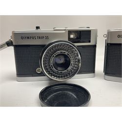 Olympus Pen-EE camera, serial no 415299, with Olympus D.Zuiko 1:3.5 f=2.8cm lens, together with four Olympus Trip 35 cameras, serial nos 4759245, 4257589, 1847727 and 5387611, each with Olympus D. Zuiko 1:28 f=40mm lenses