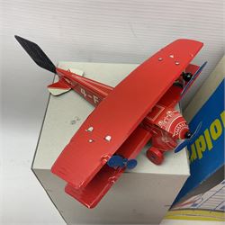 Six tinplate models of aircraft’s comprising Tucher & Walther aircraft in red, Lemezáru Gyár Space Rocket and Helicopter, MF-742 Great Flying Boat, further tinplate airplane and carousel with swinging airplanes; mostly boxed 