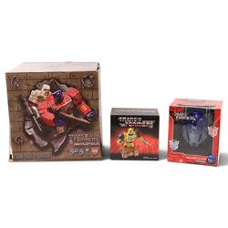 First 4 Figures Transformers Optimus Prime vs. Megatron model, together with a Hasbro Tran...