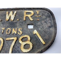Three cast iron railway wagon plates of D shaped form to include Southern Railway, LMS and GWR, L27.5cm