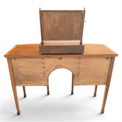 Regency design mahogany bow-front sideboard and dressing mirror, the sideboard with satinwood stringing, central frieze drawer over shaped apron flanked by cupboard doors with oval satinwood line inlaid decoration and circular pressed brass handles, on square tapering supports, the dressing mirror fitted with two drawers to the base (Mirror H 47cm, D 19cm, W 47cm)