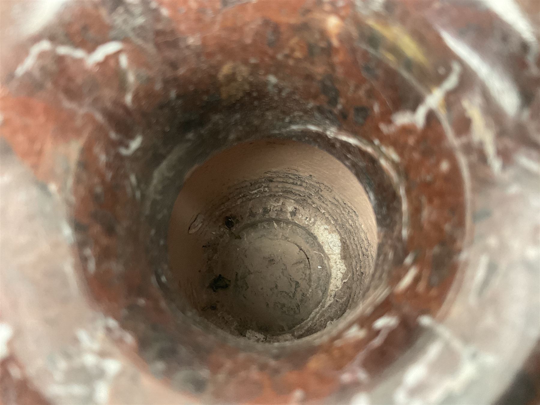 Red marble vase, of baluster form upon a stepped foot, H20cm 