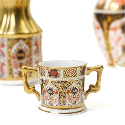 Mixed Royal Crown Derby Imari pattern 1128 wares, to include two Golden Primrose vases, both boxed, 8.5cm; five petal tray, boxed, D11.5cm, sweet tray, D13cm, miniature loving cup, boxed, and a miniature vase, H6cm etc (10)