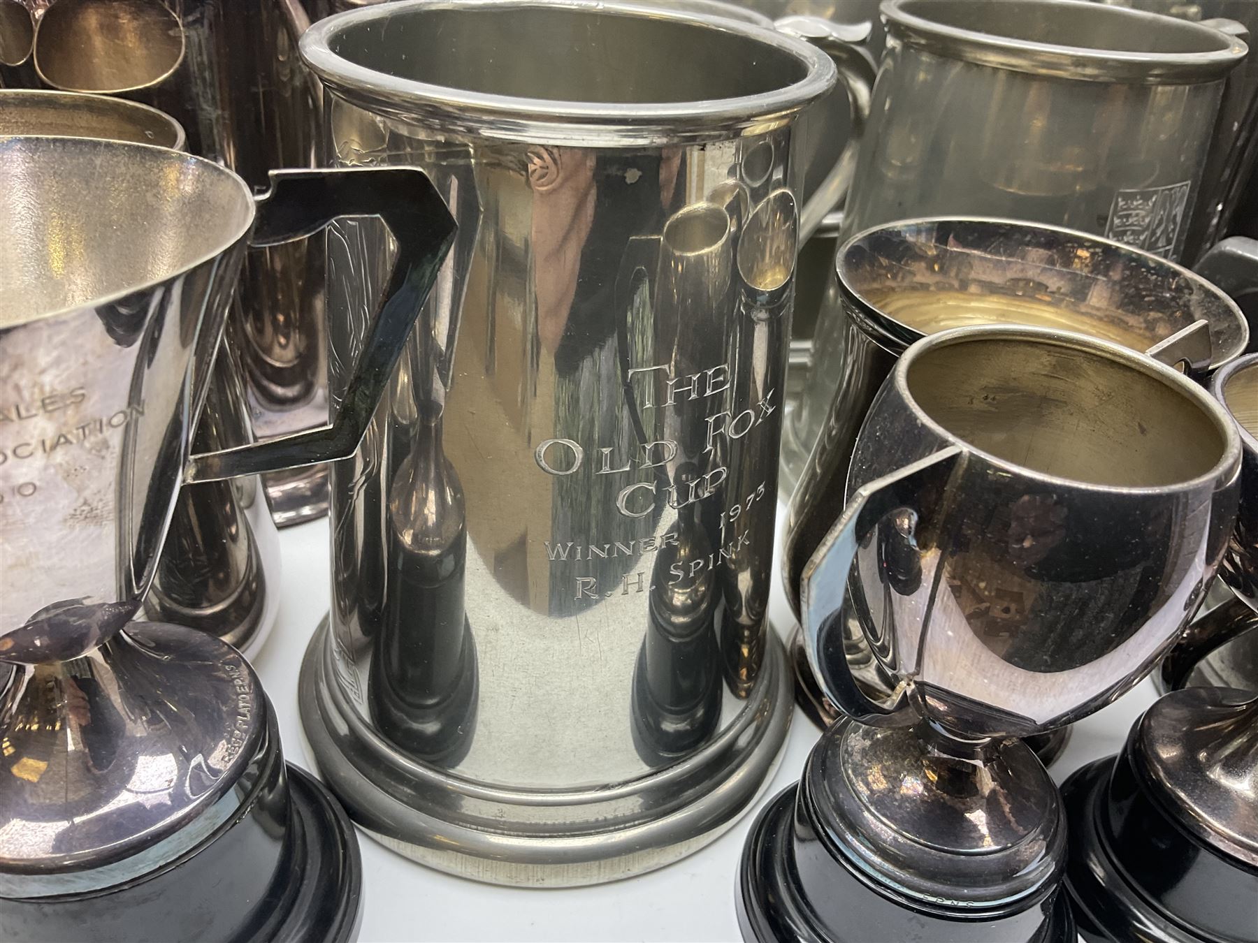 Collection of pewter and silver-plated trophy cups and presentation tankards, largest H28cm
