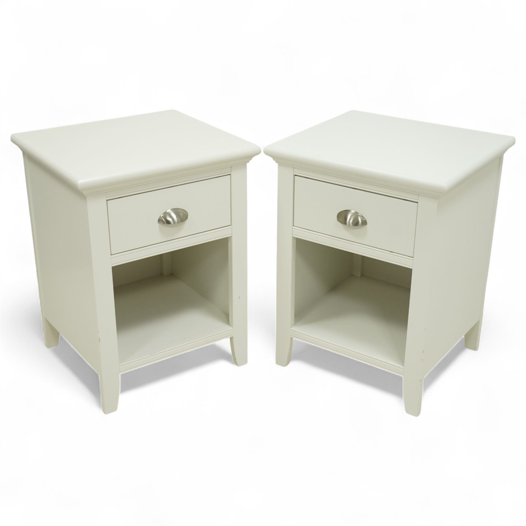 Barker & Stonehouse - pair of Carrington white bedside chests, each with moulded rectangular top over single drawer with brushed steel cup handle, open shelf below, on bracket feet