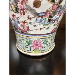 Large pair of 19th century Cantonese famille rose vases, each painted with various courtly scenes, including a display of warriors fighting on horseback before an official and his attendants, double Buddhist lion handles and applied at the shoulders with chilong, the lower band painted with Greek key motif, H58cm (2)