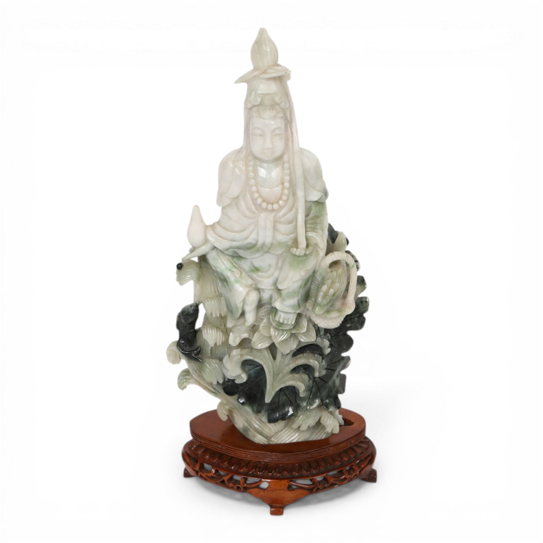 Chinese carved hardstone figure of Guanyin on wooden base, H31cm