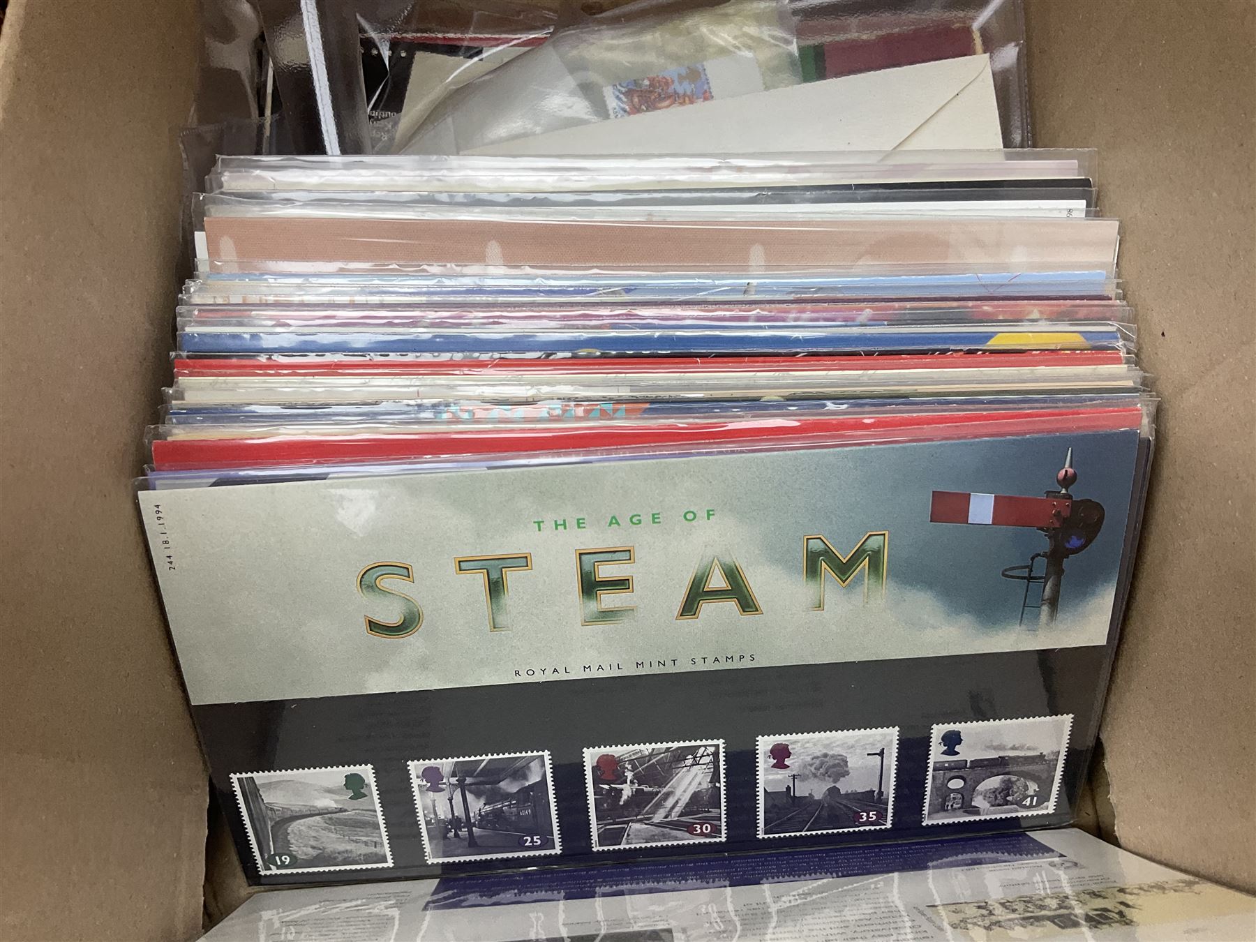 Royal Mail Queen Elizabeth II mint stamps in presentation packs, three part filled Stanley Gibbons 'Great Britain Special Stamps' albums, World stamps including Aden, Angola, Argentina, Australia etc, in various albums, in one box